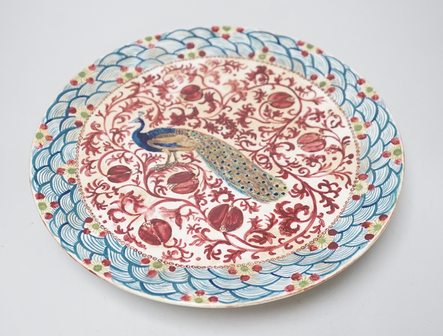 A late 19th century art pottery comport in the style of De Morgan, 25cm diameter